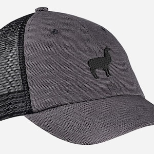 May include: A gray trucker hat with a black mesh back and a curved brim. The hat features a black embroidered llama silhouette on the front panel. The hat has a structured crown and a button on top.