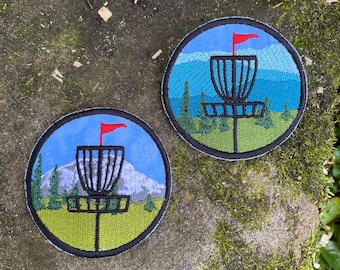 Coast to Coast handmade iron on Disc Golf circle patch. Appalachian, Rocky Mountains. Custom embroidery