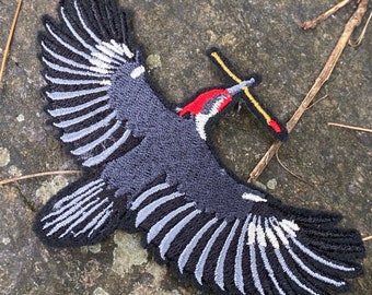 Still Life With Woodpecker handmade iron on patch. Made from recycled materials. Tom Robbins inspired