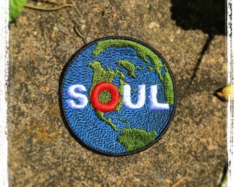 Soul Planet handmade iron on patch.  Made from Recycled materials. Custom Embroidery