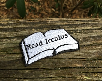 Read Icculus book handmade iron on patch. Made from recycled materials!