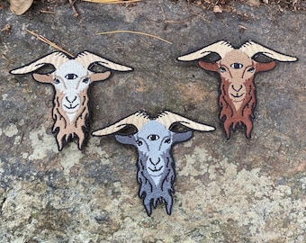 Three-eyed goat iron-on handmade patch.  Custom embroidery.