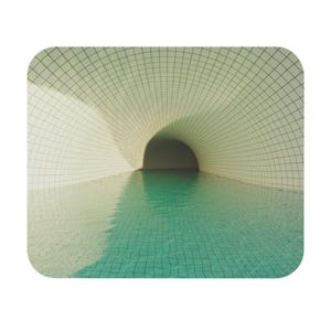May include: A rectangular mouse pad featuring a graphic print of an indoor swimming pool. The design shows a curved, white tiled tunnel ceiling reflecting over calm, turquoise water. The grid pattern of the tiles creates a sense of depth.