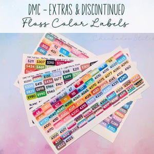 May include: A stack of DMC floss color labels with the text "DMC - EXTRAS & DISCONTINUED Floss Color Labels." The labels are white with various color-coded sections and printed numbers. The labels are for cross-stitch and embroidery.