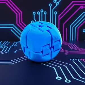 May include: A bright blue, spherical puzzle toy with a segmented design. The toy is set against a dark background with a circuit board pattern in white, pink, and blue.