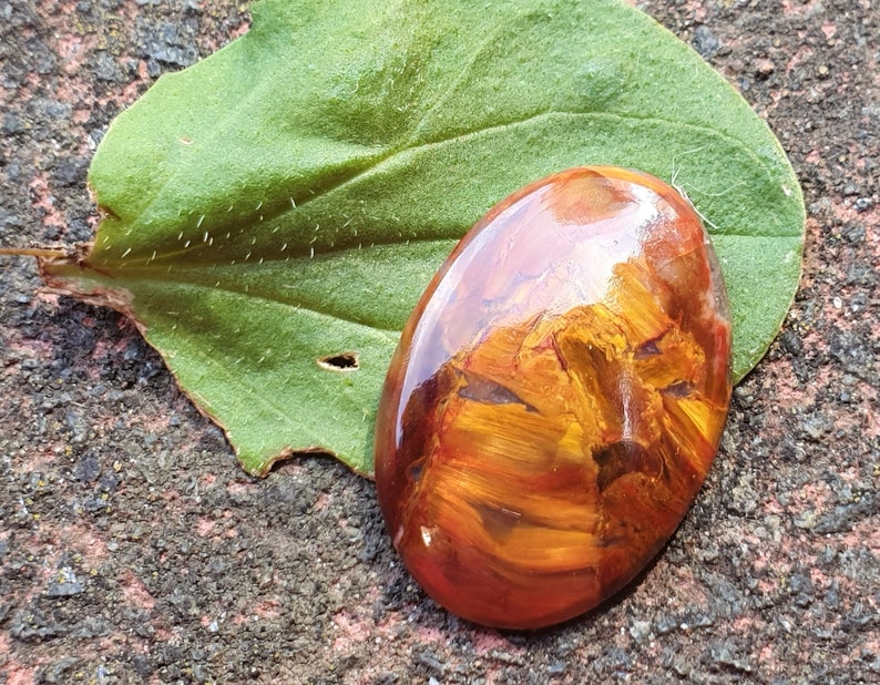 23mm Red Pietersite oval cabochon from Namibia 23 by 16 by 3mm 7cts