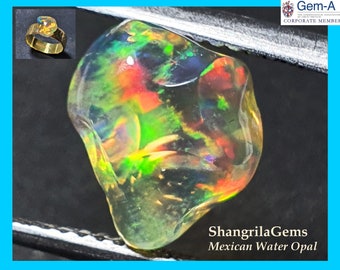 10.3mm 2.57ct Mexican Jelly Water Fire opal with Rainbow Fire 10.3 by 8.2 by 6mm Magdalena Jalisco Mexico WITH VIDEO