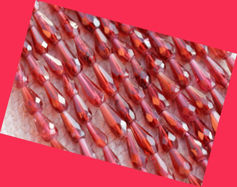 we suggest using 0.010in 0.25mm wire 14 7mm to 10mm Rhodolite Garnet drop shape faceted beads GARR03