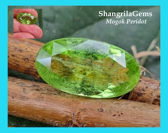 19mm 12.2ct Peridot oval gemstone faceted Apple Green Color Mogok Mine natural & untreated 19 by 11 by 7mm approx