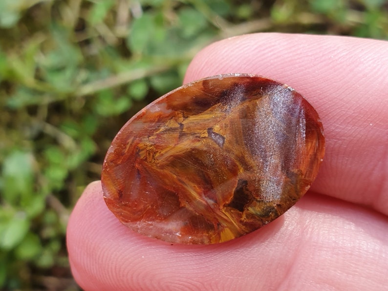 23mm Red Pietersite oval cabochon from Namibia 23 by 16 by 3mm 7cts