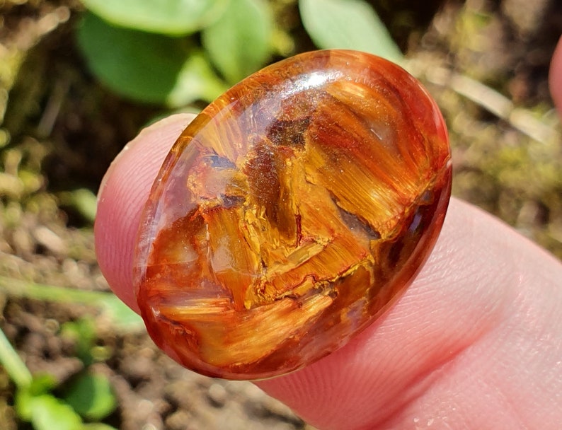 23mm Red Pietersite oval cabochon from Namibia 23 by 16 by 3mm 7cts
