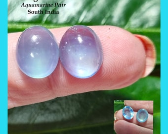 12mm by 10mm Aquamarine oval cabochon Pair 10.43ct 12.1 by 10.1 by 6.2 & 12.2 by 10 by 5.35mm