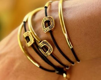 Aura-Black Leather Wrap Bracelet in Gold