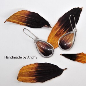 Stainless steel drop earrings with real rudbeckia flower