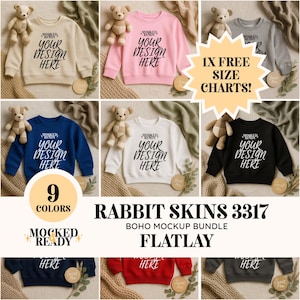 May include: A flatlay product mockup featuring nine different colored sweatshirts. Each sweatshirt has the text "YOUR DESIGN HERE" printed on the front. The image also includes a teddy bear and the text "1X FREE SIZE CHARTS!"