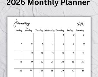 May include: A white 2026 monthly planner with the month of January displayed. The planner features a simple calendar layout with dates and days of the week. The text "2026 Monthly Planner" is at the top.