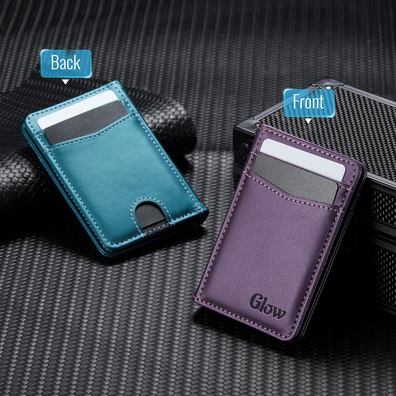 May include: Two slim card wallets, one teal and one purple, are displayed. The teal wallet is labeled "Back" and the purple wallet is labeled "Front". Both wallets have card slots and are made of a smooth material. The purple wallet has the word "Glow" printed on it.