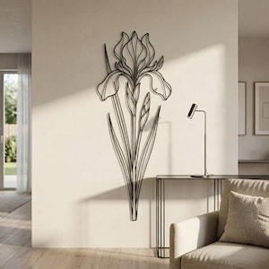 May include: A black metal wall art piece shaped like an iris flower with a central bloom, a smaller bud, and long, slender leaves extending downwards. The design features clean, continuous lines forming the silhouette of the plant.