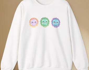 Sudadera Happy Microbe Trio / Linda caricatura de bacterias con cuello redondo