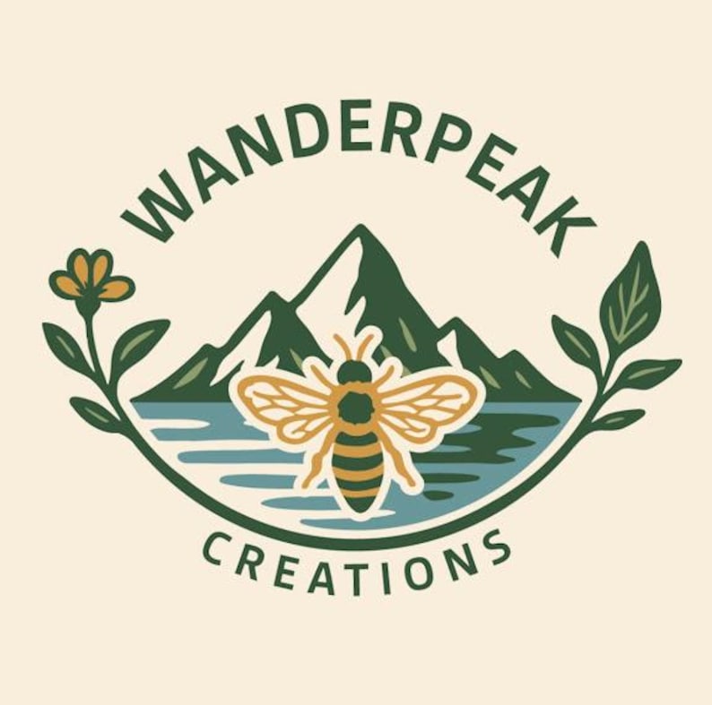 May include: A circular logo with the text "WANDERPEAK CREATIONS" in green. The logo features a stylized bee with outstretched wings, mountains, water, and floral elements, all in a nature-inspired design.