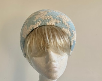 Based on the halo hat of the Duchess of Cambridge but with lots of character of its own off white with power blue houndstooth pattern
