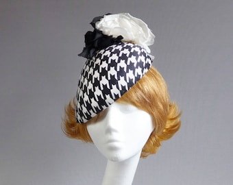 Two tone hat in houndstooth with ton sur ton flowers included but optional birdcage veil on comb