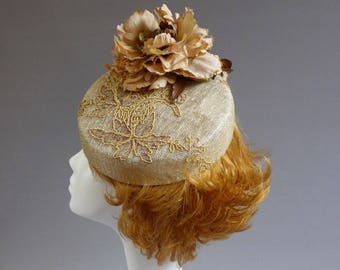 Dutch design made with passion creme  percher hat with brown gold and copper lace and ton sur ton flower on comb