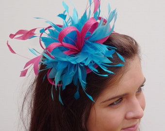 Handmade sea blue and hot pink fascinator on aliceband sinamay with lots of feathers and two included but optional birdcage veils