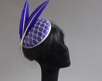 blue purple sinamay minihat / fascinator covered with vintage inspired veiling in white with ton sur ton feathers on comb