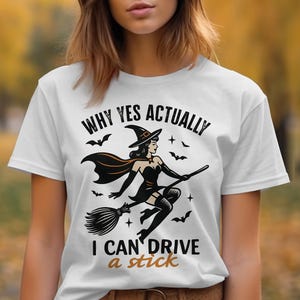 Witch Riding Broomstick Halloween T-Shirt, Funny Halloween Witch Shirt, I Can Drive a Stick Graphic Tee, Halloween Costume Tee