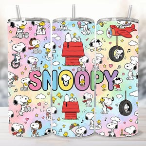 May include: A cylindrical stainless steel tumbler featuring a colorful pastel tie-dye background with a repeating pattern of Snoopy and Woodstock characters. The word SNOOPY is printed in large, multi-colored letters across the center. Includes a lid and straw.