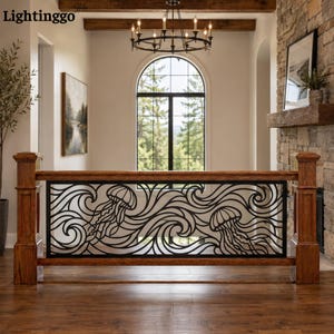 May include: A black metal railing panel featuring a decorative cutout design of two jellyfish swimming amidst swirling ocean waves. The panel is framed by a wooden structure with two vertical posts, positioned in a hallway with a stone fireplace.