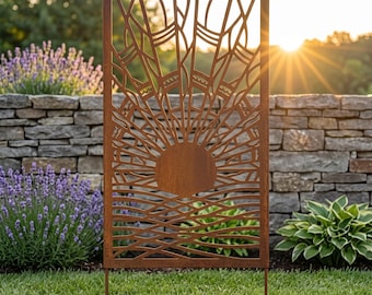 May include: A rectangular metal garden screen with a rust-colored finish featuring a laser-cut design of a sun rising over stylized waves. The panel has a solid frame and is positioned vertically, displaying intricate geometric patterns.