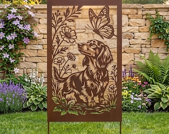 May include: A rectangular metal garden screen with a rust-colored finish featuring a laser-cut design of a long-haired dachshund dog standing among flowers with a large butterfly positioned above the dog's head in the upper right corner.