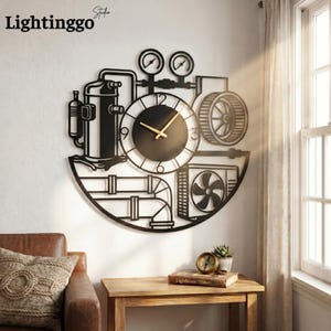 May include: Black metal wall clock with a mechanical design, featuring gears, gauges, and a central clock face with gold hands. The clock has a semi-circular base and is mounted on a white wall. The brand name "Lightinggo" is visible in the top left corner.