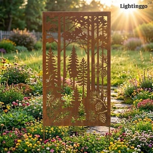 May include: A decorative, rust-colored metal garden screen featuring a cut-out forest scene with trees, pinecones, and foliage. The screen is supported by two metal legs and is placed in a garden with a variety of colorful flowers. The text "Lightinggo" is visible.