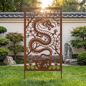 May include: A rectangular metal garden screen with a rust-colored finish featuring a laser-cut design of a dragon surrounded by cherry blossom branches and flowers. The bottom section includes stylized clouds and two koi fish swimming in water.
