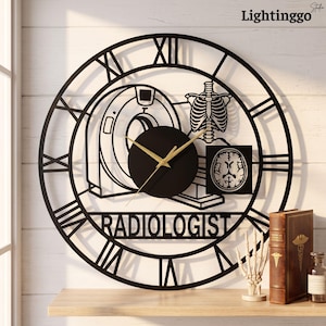 May include: A black metal wall clock featuring Roman numerals and a central design depicting a CT scanner, a human rib cage, and a cross-section of a brain. The word RADIOLOGIST is cut out at the bottom. The clock has gold-colored hands.