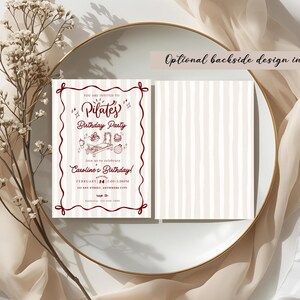 A soft and elegant Pilates birthday invitation featuring hand-drawn Pilates reformer illustrations, Pilates accessories, and minimal line art in a neutral beige and deep red color palette. This editable Pilates birthday party invitation template is designed with subtle stripes, a whimsical border, and modern script typography, perfect for a Pilates-themed birthday celebration or fitness party.