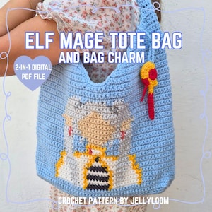 May include: A light blue crochet tote bag with an elf mage design and a matching bag charm. The bag features a detailed image of an elf mage in shades of beige, white, and yellow. Text on the bag reads "ELF MAGE TOTE BAG AND BAG CHARM".