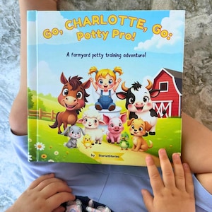 Może przedstawiać: Książka dla dzieci zatytułowana "Go, Charlotte, Go: Potty Pro!" przedstawia scenę z farmy z kreskówkowymi zwierzętami i dziewczynką. Okładka przedstawia czerwony budynek gospodarczy, konia, krowę, świnię, owcę i psa.