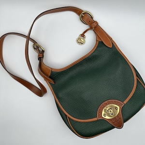 Sac à main Dooney and Bourke en cuir bleu marine et marron