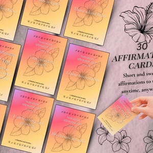 May include: A collection of 30 affirmation cards with a gradient background of pink, orange, and yellow. Each card features a floral illustration and positive affirmations. The text on the cards reads "Tiny Truths" and "I am worthy of love."