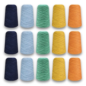 May include: A collection of fifteen spools of yarn in various colors, including navy blue, light blue, green, yellow, and orange. The spools are arranged in three rows of five, showcasing the different shades of yarn available for crafting projects.