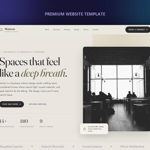 May include: A website template for Maison Interior Studio featuring a cream-colored background with black text. The layout includes the heading Spaces that feel like a deep breath, navigation links, a black and white interior photograph, and statistics.