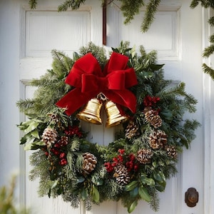 May include: A festive Christmas wreath with evergreen branches, pinecones, and red berries. A large red velvet bow sits above two golden bells. The wreath is displayed on a white door.
