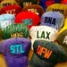 see more listings in the Airport Code Hats section