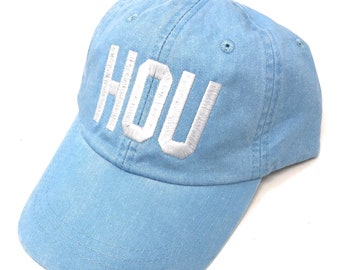 Custom Embroidered HOU William P. Hobby Airport Code Baseball Hat (Pigment Dyed Baby Blue with White Letters)