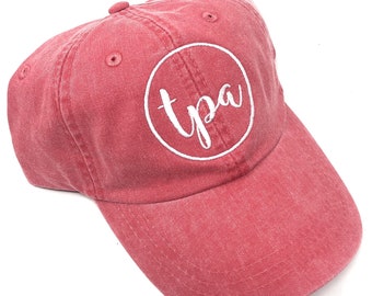 Custom Embroidered Circle TPA Tampa International Airport Code Baseball Hat (Poppy with White Letters)