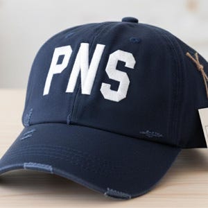 Custom Embroidered PNS Pensacola Airport Code Distressed Trucker Hat Baseball Cap Gift